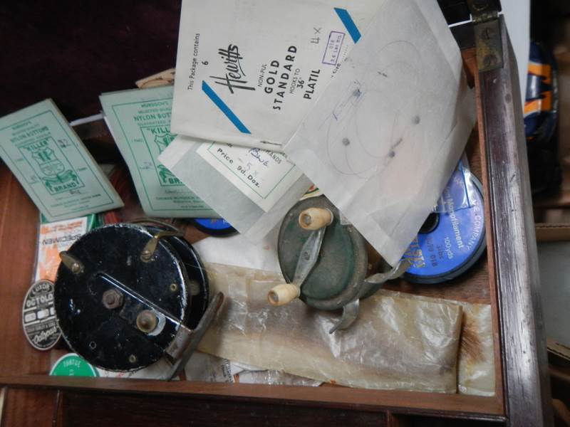 A quantity of vintage fishing reels etc., in a rosewood box. - Image 3 of 4