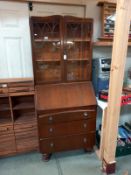 A 1930's oak bureau bookcase with leaded glass doors COLLECT ONLY.