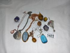 A selection of old stone necklaces, 6 with neck chains and other items. 11 in total.