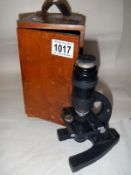 A mahogany boxed BN JP.S London microscope