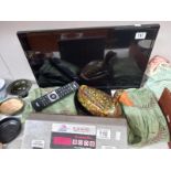 A 24" flat screen tv, 2 items of material and wooden duck egg holder COLLECT ONLY