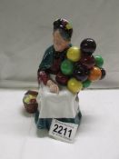 A Royal Doulton figure 'The Old Balloon Seller' HN1315 in good condition.