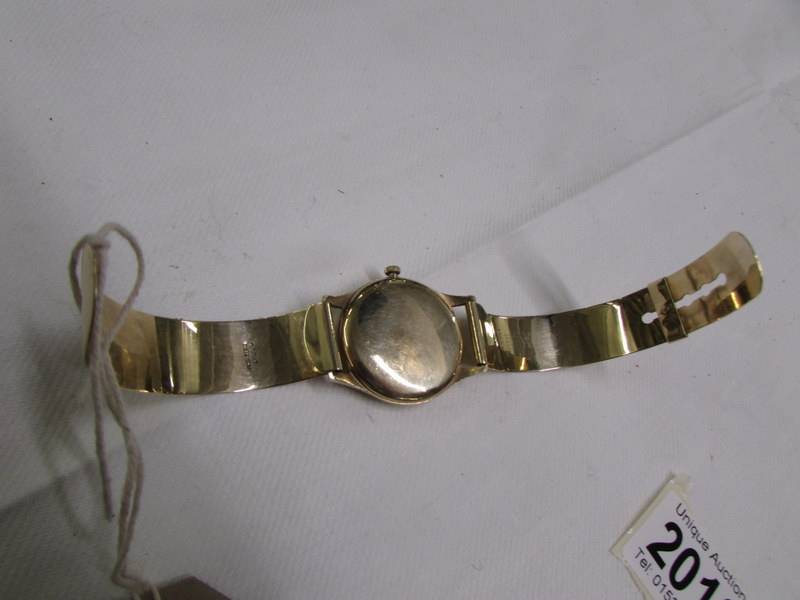 A 9ct gold Omega wrist watch on a 9ct gold strap, in working order. - Image 3 of 11