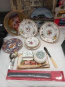 A selection of collectors plates and thermometers, spoons, toothpick pot etc.