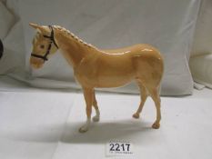 A Royal Doulton horse, in good condition,.