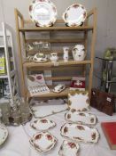 A mixed lot of Royal Albert Old Country Roses includind telephone, vases, dishes, tray, place mats.