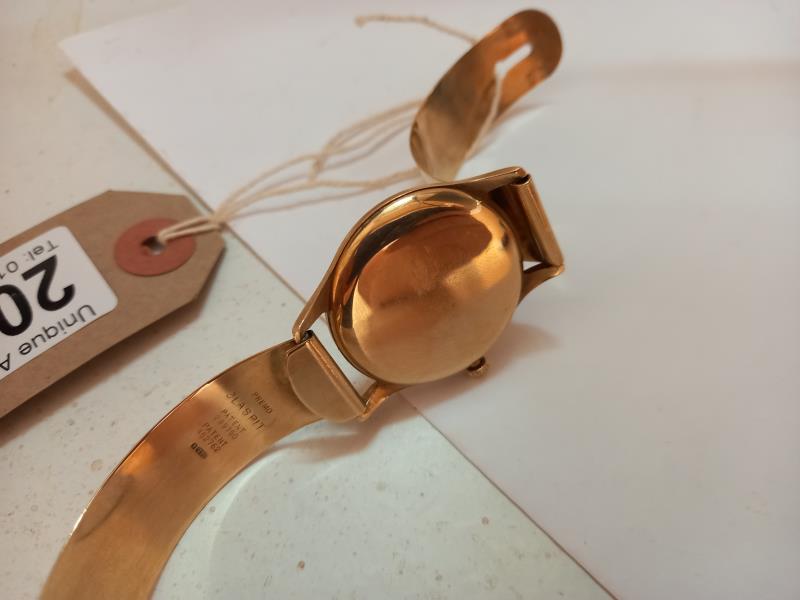 A 9ct gold Omega wrist watch on a 9ct gold strap, in working order. - Image 9 of 11