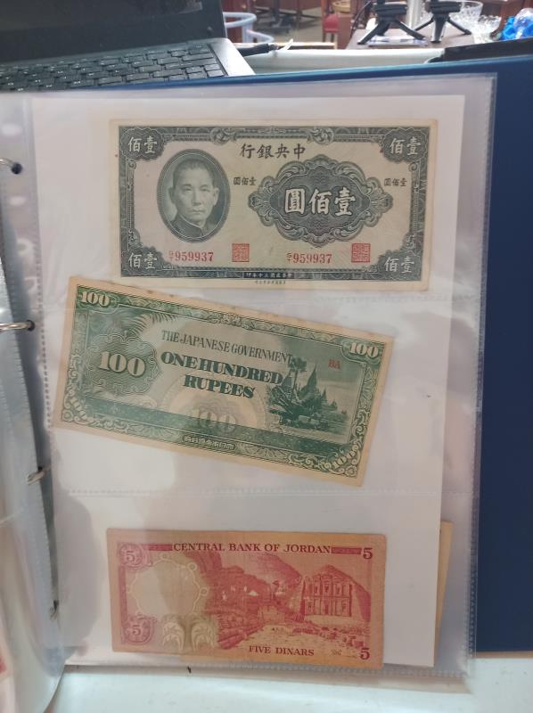 An album of approximately 86 world bank notes. - Image 21 of 26