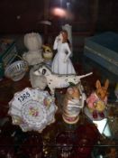 A good selection of china including Crown Derby, Belleek, Royal Doulton and Beswick.