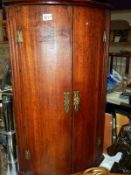 An early Victorian bow front corner cupboard. Collect Only.