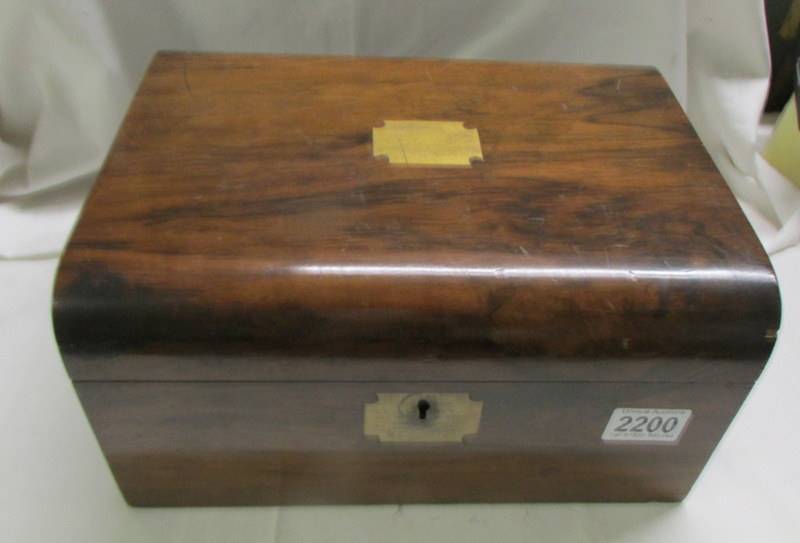 A mahogany writing slope with brass fittings (needs repair to slope on inside).