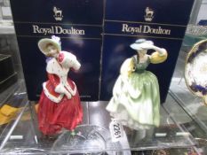 Two boxed Royal Doulton figurines - Christmas Morn HN1992 and Buttercup HN2309.