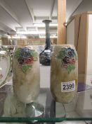 A pair of Royal Doulton stoneware vases in good condition and one other Doulton vase a/f.