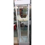 A metal framed white display cabinet ( Plastic sides, glass shelves, 48cm x 44cm x 175cm)