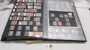 Two stamp albums of South Africa/Venezuala stamps etc.,