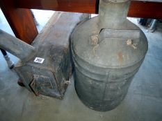A galvanised tank & large can