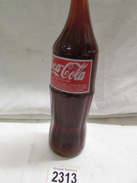 A novelty vintage mis-shapen coke bottle. - Image 2 of 3
