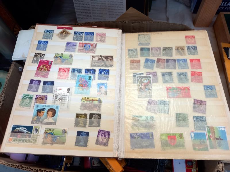 A collection of stamps in UK, & World albums of Jersey, Guernsey & some mint etc. - Image 3 of 7
