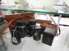 A pair of leather cases Copitar 7 x 15 x 35 binoculars and a cased Kodak Hawkeye Ace box.