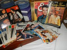 A good lot of Elvis memorabilia including fan club magazines.