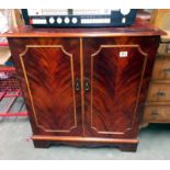 A dark wood stained 2 door cupboard with inner drawer. 79cm x 47cm x height 88cm. COLLECT ONLY.