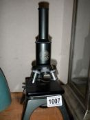 An old C Backer, No. 6229 microscope