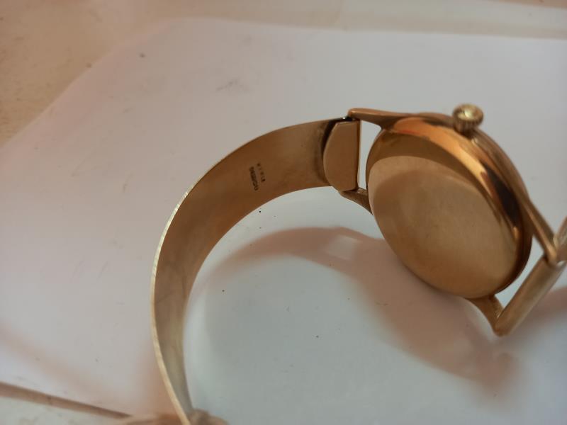 A 9ct gold Omega wrist watch on a 9ct gold strap, in working order. - Image 7 of 11