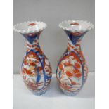 A pair of Japanese vases 1 with a fine crack