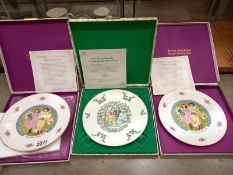 Two Royal Doulton 1976 Valentine plates and a 1977 Christmas plate.