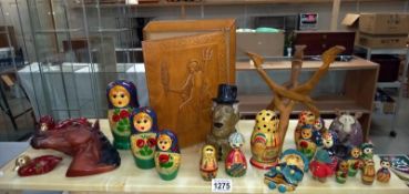 A quantity of wooden items including Russian Dolls