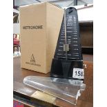 A new Metronome in original box.