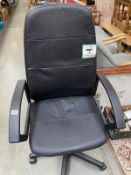 A black leather style office chair