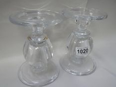 2 heavy glass candlesticks