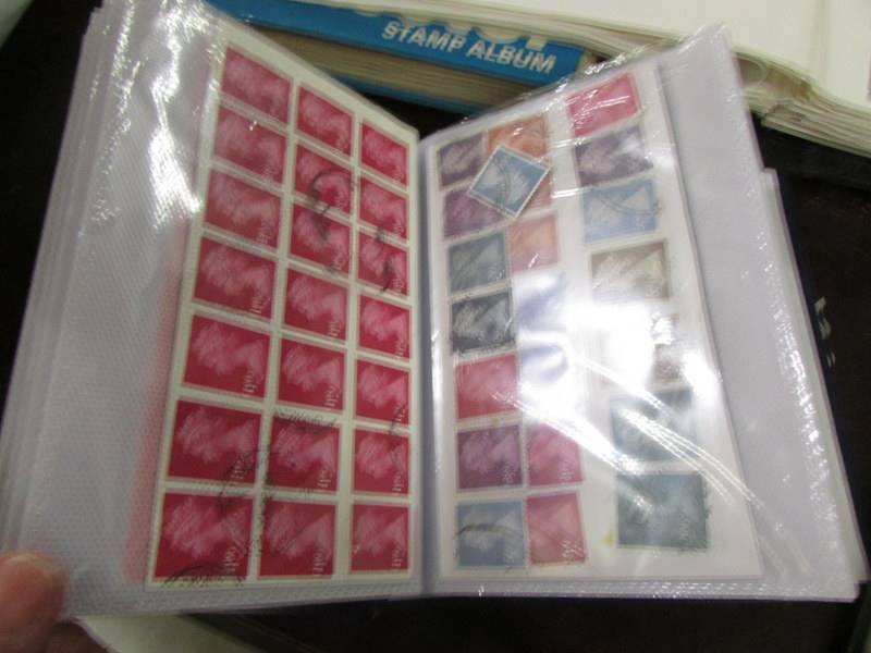A collection of UK stamps in five albums/folders. - Image 14 of 14