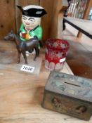 An old Toby jug, ruby glass old horse & collectors tin