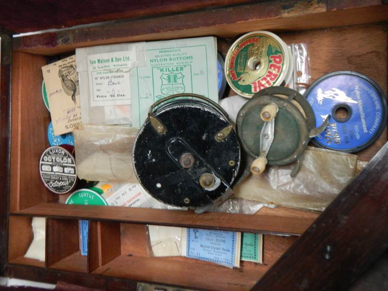 A quantity of vintage fishing reels etc., in a rosewood box. - Image 2 of 4