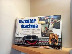 A boxed sweater machine