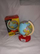 A 1950's metal Chad Valley globe in a box