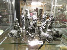 A set of twelve Nativity figures.