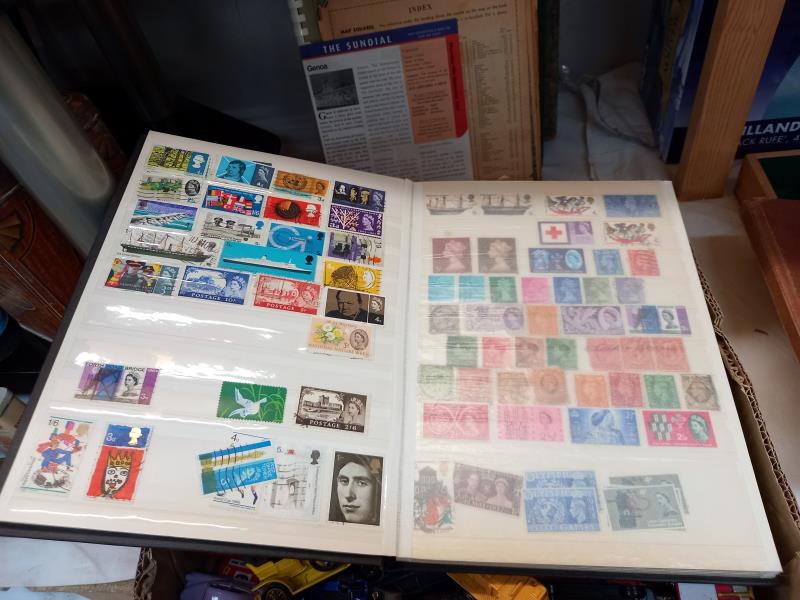 A collection of stamps in UK, & World albums of Jersey, Guernsey & some mint etc. - Image 6 of 7