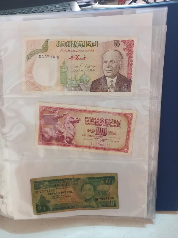 An album of approximately 86 world bank notes. - Image 8 of 26