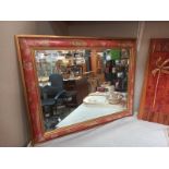 A floral framed mirror. 73.5cm. Collect Only