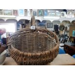 An unusual old early 20th century rush basket