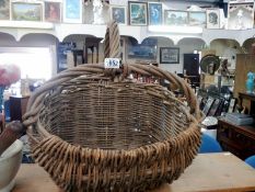 An unusual old early 20th century rush basket