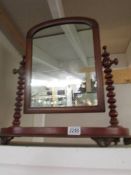 A Victorian mahogany toilet mirror with barley twist supports, COLLECT ONLY