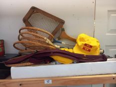A collection of Ruston Bucyrus caps & ties & a badminton racket etc.