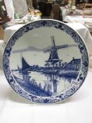 A Delft blue and white charger, 39 cm diameter.