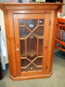 A pine 20th century astragal glazed corner unit