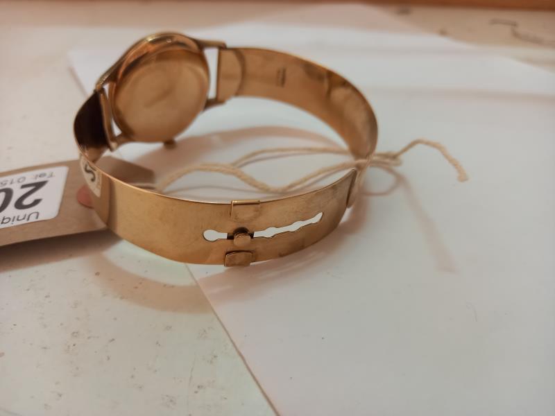 A 9ct gold Omega wrist watch on a 9ct gold strap, in working order. - Image 11 of 11