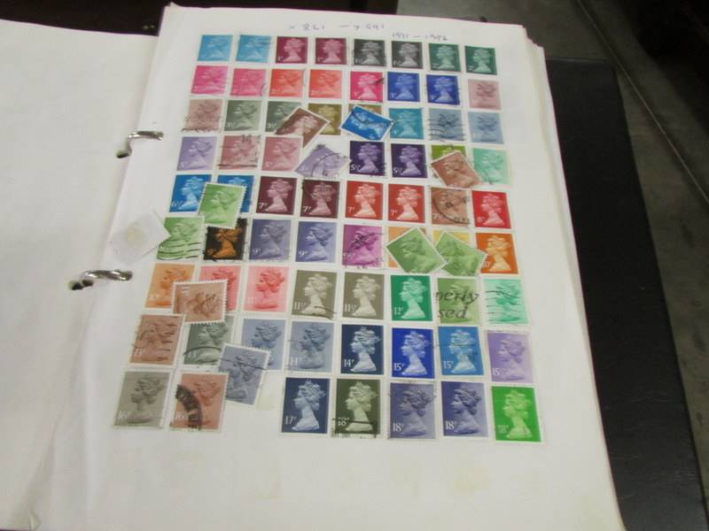 A collection of UK stamps in five albums/folders. - Image 8 of 14